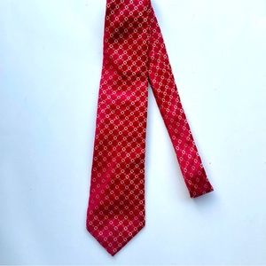 BOSS Hugo Boss Silk tie. Red with white patterns.